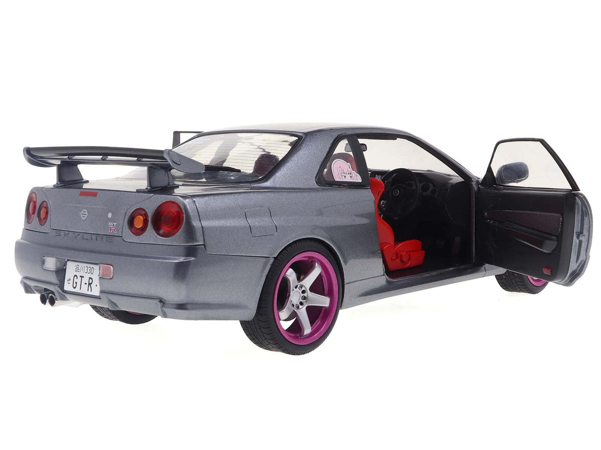 1999 Nissan Skyline GT-R (R34) RHD (Right Hand Drive) Silver Metallic with Purple Wheels 1/18 Diecast Model Car by Solido