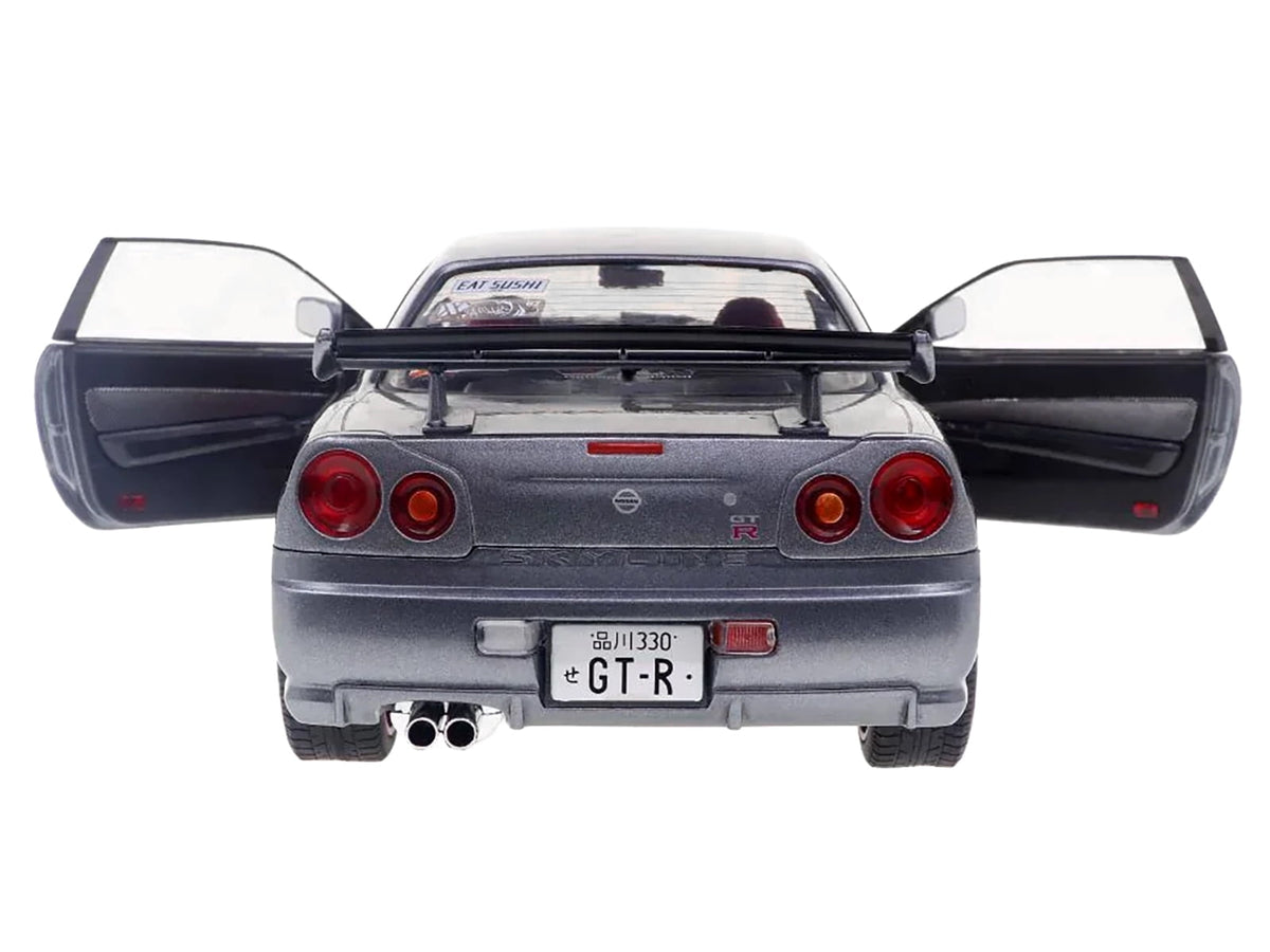 1999 Nissan Skyline GT-R (R34) RHD (Right Hand Drive) Silver Metallic with Purple Wheels 1/18 Diecast Model Car by Solido