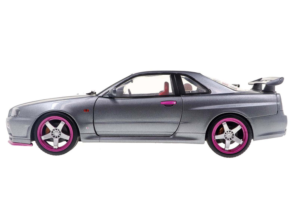 1999 Nissan Skyline GT-R (R34) RHD (Right Hand Drive) Silver Metallic with Purple Wheels 1/18 Diecast Model Car by Solido