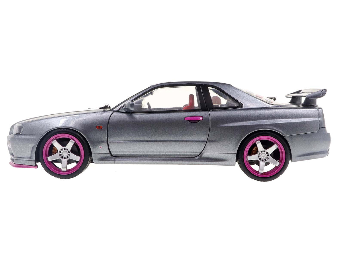 1999 Nissan Skyline GT-R (R34) RHD (Right Hand Drive) Silver Metallic with Purple Wheels 1/18 Diecast Model Car by Solido