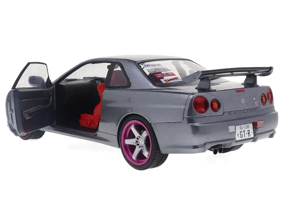 1999 Nissan Skyline GT-R (R34) RHD (Right Hand Drive) Silver Metallic with Purple Wheels 1/18 Diecast Model Car by Solido