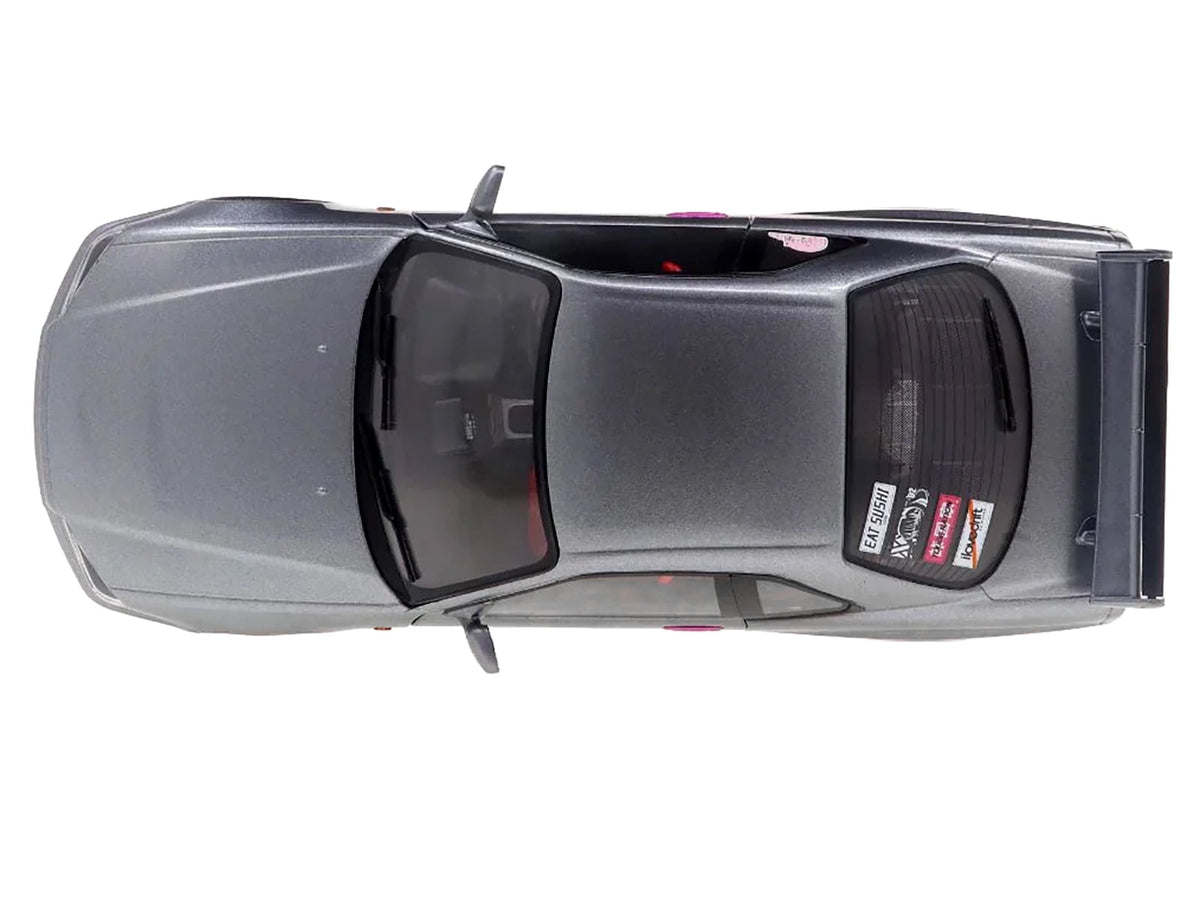 1999 Nissan Skyline GT-R (R34) RHD (Right Hand Drive) Silver Metallic with Purple Wheels 1/18 Diecast Model Car by Solido